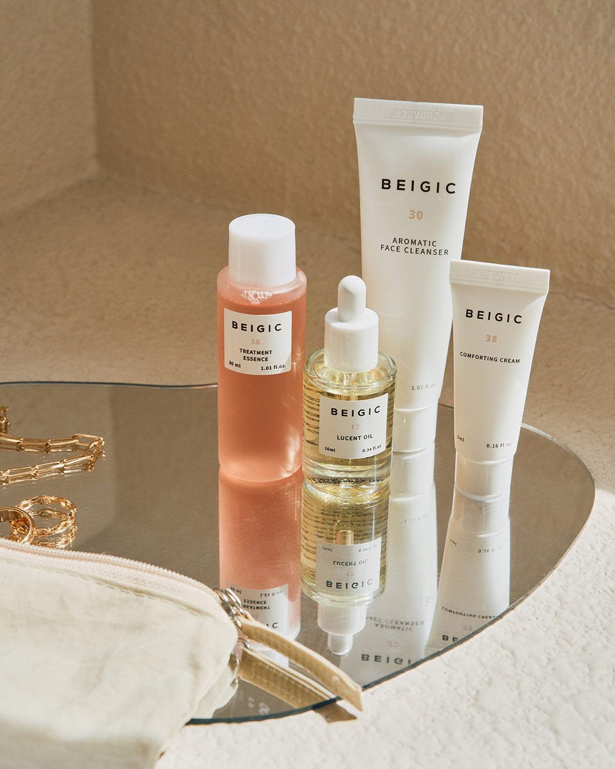 Kit de viaje con esenciales vegano limpiador esencia mascarrilla aceite facial y crema hidratante Beigic